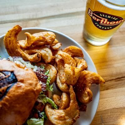 Bacon cheeseburger, fries, and beer